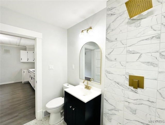 169 Davidson Ave, Buffalo, NY 14215 - full bath with vanity, a shower, baseboards, toilet, and wood finished floors