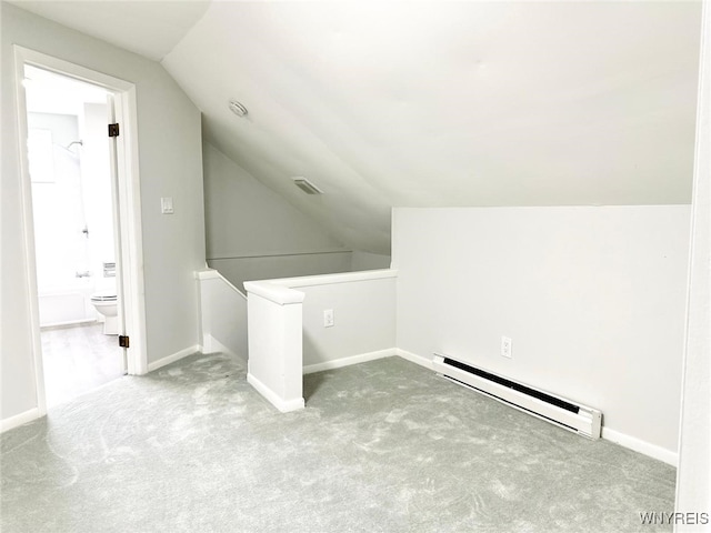 169 Davidson Ave, Buffalo, NY 14215 - additional living space featuring a baseboard radiator, lofted ceiling, carpet flooring, and baseboards