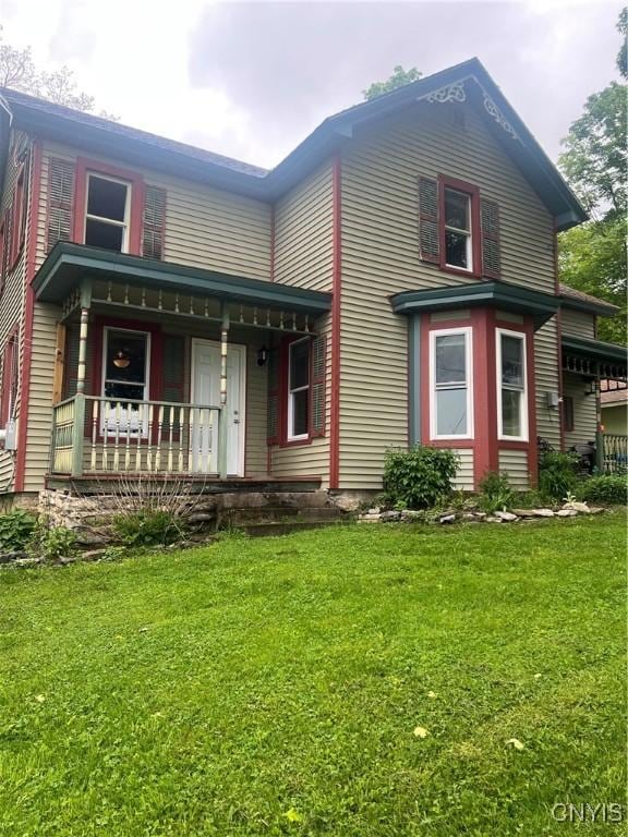 6265 Haslauer Rd, Stockbridge, NY 13409 - view of front of property featuring covered porch and a front yard