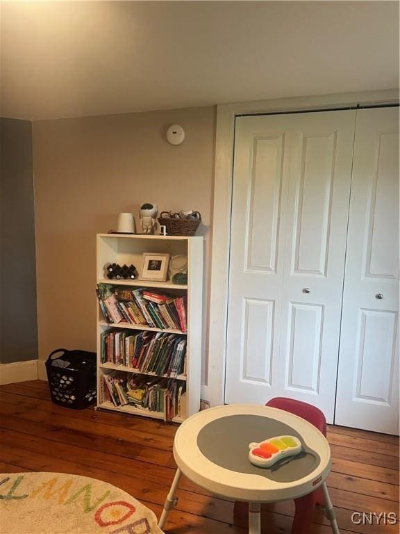 6265 Haslauer Rd, Stockbridge, NY 13409 - sitting room with wood finished floors and baseboards