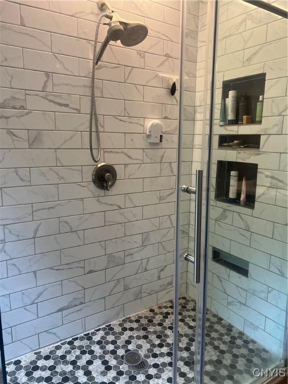 6265 Haslauer Rd, Stockbridge, NY 13409 - full bath featuring a shower stall