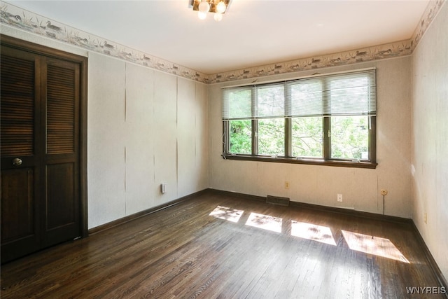 126 Crestwood Ln, Amherst, NY 14221 - spare room featuring dark wood-style floors and baseboards