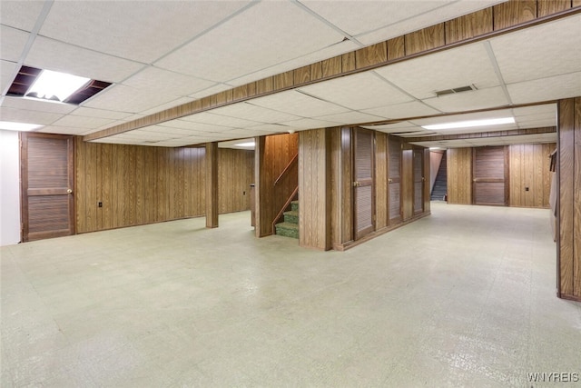126 Crestwood Ln, Amherst, NY 14221 - finished basement featuring a drop ceiling, stairway, and wooden walls