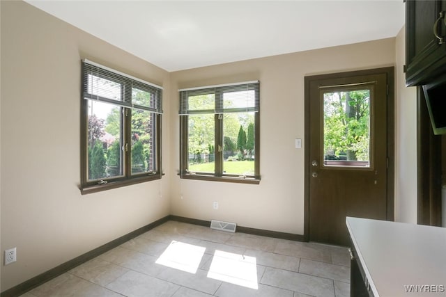 126 Crestwood Ln, Amherst, NY 14221 - entrance foyer with baseboards and light tile patterned flooring