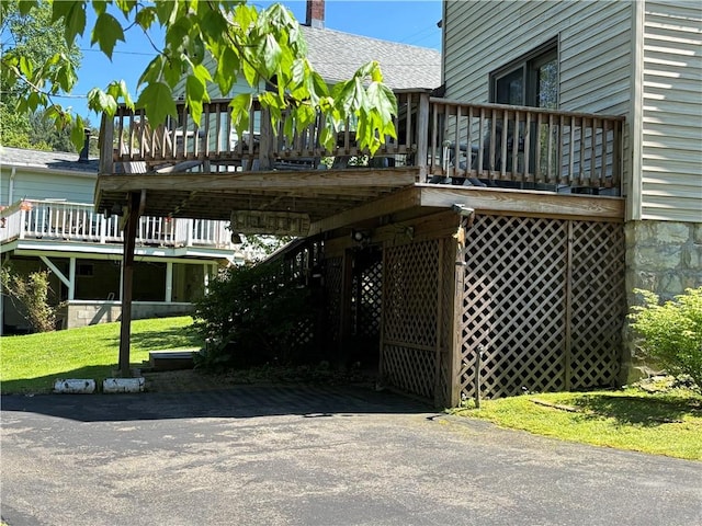 21 Curtis Rd, Hamilton, PA 16333 - view of property exterior with stairs, a wooden deck, and a shingled roof