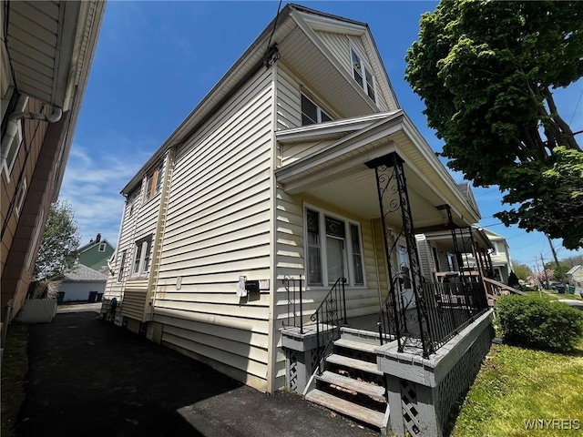 228 Weiss St, Buffalo, NY 14206 - view of side of property featuring a porch