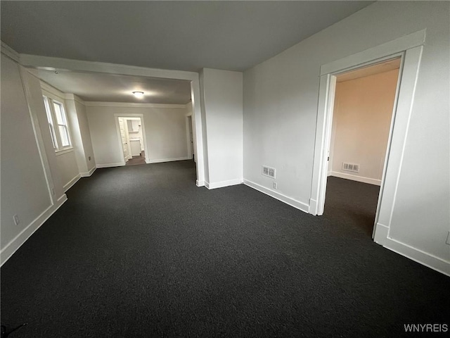 228 Weiss St, Buffalo, NY 14206 - empty room with baseboards and dark colored carpet