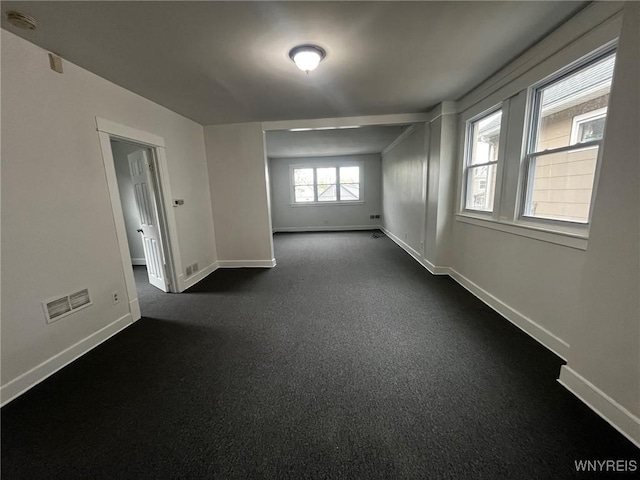 228 Weiss St, Buffalo, NY 14206 - spare room featuring baseboards and a smoke detector