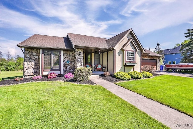4590 Beach Ridge Rd, Pendleton, NY 14094 - view of front of home with a garage, a front yard, covered porch, and stone siding