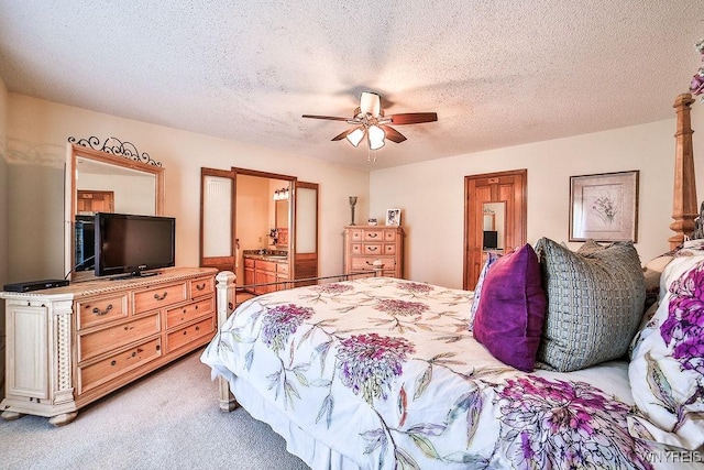 4590 Beach Ridge Rd, Pendleton, NY 14094 - bedroom featuring light colored carpet, ensuite bathroom, ceiling fan, and a textured ceiling