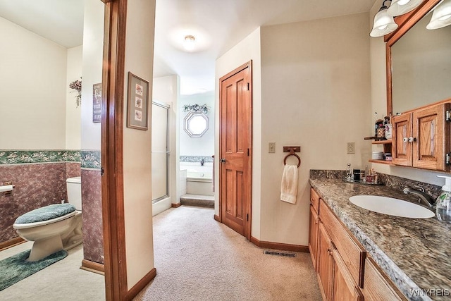 4590 Beach Ridge Rd, Pendleton, NY 14094 - bathroom featuring a shower stall, vanity, toilet, a bath, and baseboards