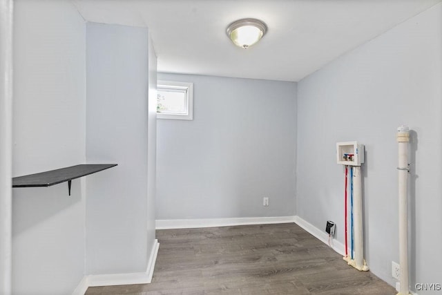 210 Essex St, Syracuse, NY 13204 - laundry room featuring hookup for a washing machine, wood finished floors, and baseboards