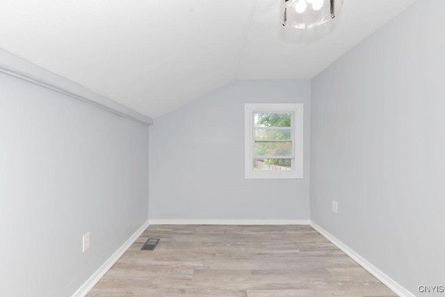 210 Essex St, Syracuse, NY 13204 - additional living space with lofted ceiling, light wood-style flooring, and baseboards