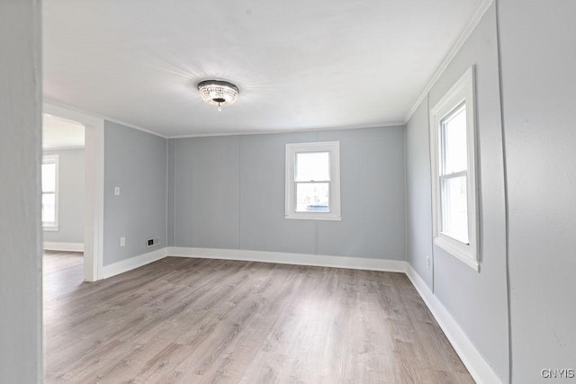210 Essex St, Syracuse, NY 13204 - empty room with light wood-type flooring, baseboards, and ornamental molding