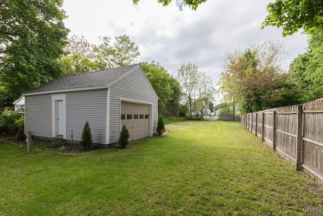 210 Essex St, Syracuse, NY 13204 - view of yard with an outdoor structure and a garage