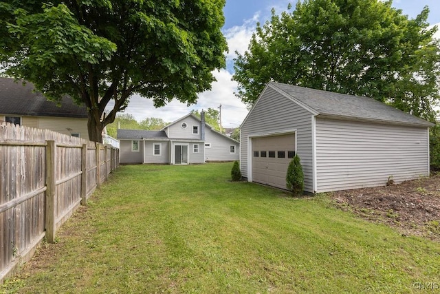 210 Essex St, Syracuse, NY 13204 - view of yard with an outdoor structure and a garage