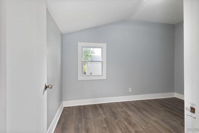 210 Essex St, Syracuse, NY 13204 - unfurnished room featuring dark wood finished floors, vaulted ceiling, and baseboards