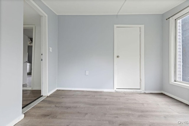 210 Essex St, Syracuse, NY 13204 - unfurnished room with wood finished floors, attic access, and baseboards