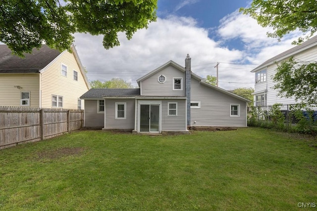 210 Essex St, Syracuse, NY 13204 - rear view of property featuring a chimney