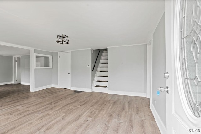 210 Essex St, Syracuse, NY 13204 - entrance foyer featuring stairway, wood finished floors, and baseboards