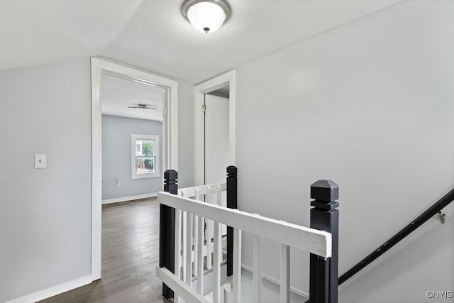210 Essex St, Syracuse, NY 13204 - hall with an upstairs landing, wood finished floors, and baseboards
