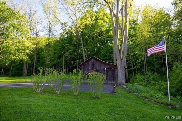 4748 Thrall Rd, Cambria, NY 14094 - view of grassy yard with an outbuilding