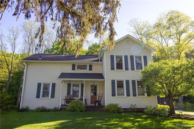 4748 Thrall Rd, Cambria, NY 14094 - view of front of property with a porch and a front yard