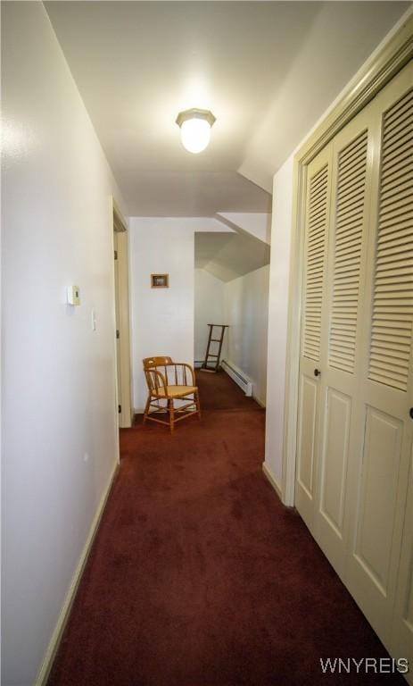 4748 Thrall Rd, Cambria, NY 14094 - corridor featuring carpet floors, baseboard heating, baseboards, and lofted ceiling