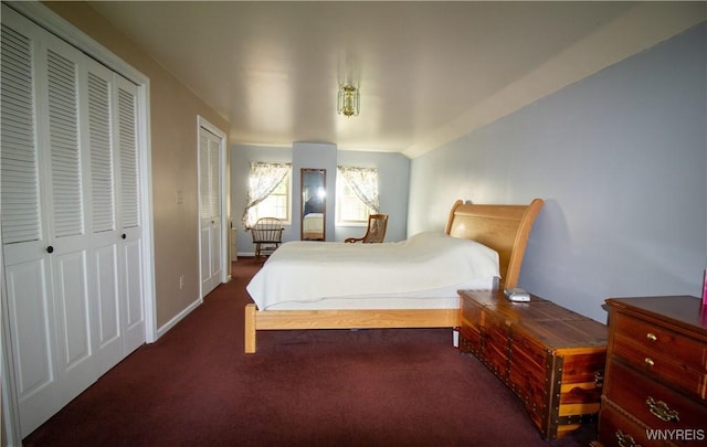4748 Thrall Rd, Cambria, NY 14094 - bedroom with carpet floors, two closets, and baseboards