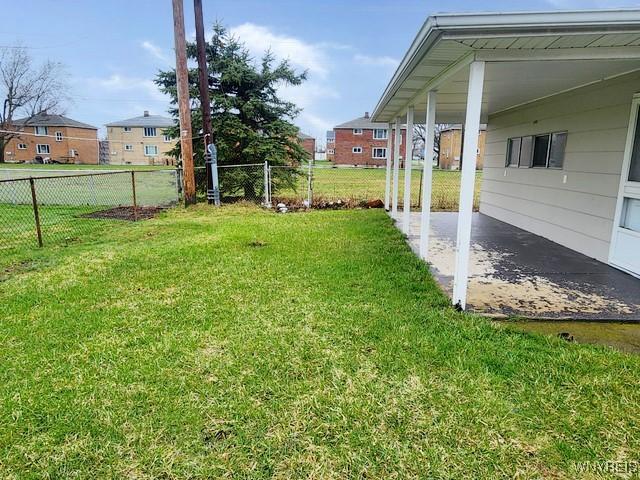 146 Lou Ann Dr, Cheektowaga, NY 14043 - view of yard featuring a carport and a patio