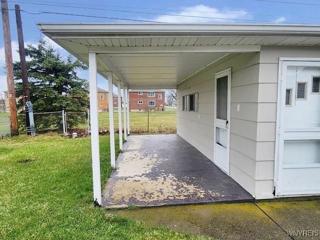 146 Lou Ann Dr, Cheektowaga, NY 14043 - view of patio / terrace with a carport