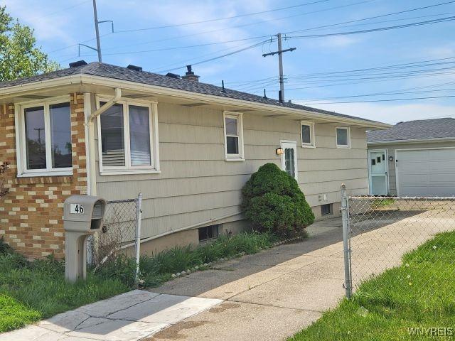 146 Lou Ann Dr, Cheektowaga, NY 14043 - view of side of home with a garage