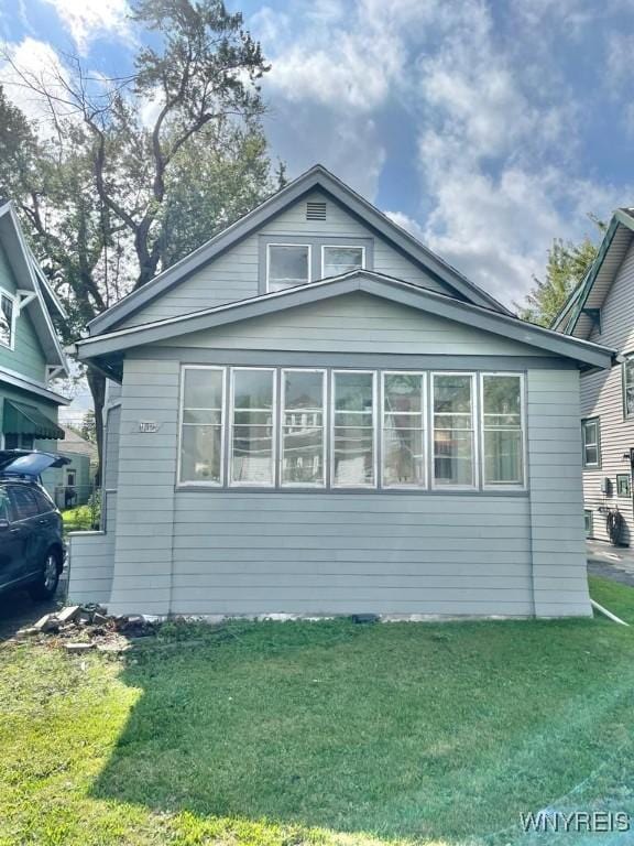 199 Berkshire Ave, Buffalo, NY 14215 - view of property exterior with a lawn