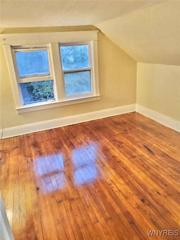 199 Berkshire Ave, Buffalo, NY 14215 - bonus room with baseboards, hardwood / wood-style flooring, and vaulted ceiling