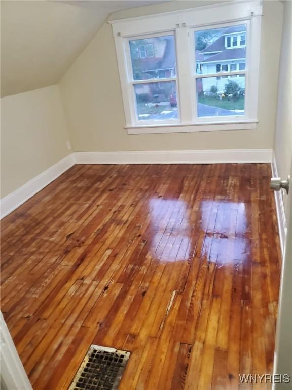 199 Berkshire Ave, Buffalo, NY 14215 - bonus room with wood-type flooring, vaulted ceiling, and baseboards