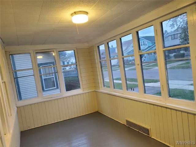 199 Berkshire Ave, Buffalo, NY 14215 - unfurnished sunroom with wood finished floors and wood walls