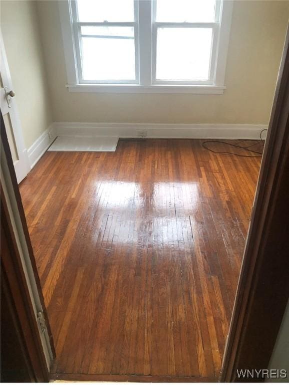 11 Verdun Ave, Buffalo, NY 14214 - spare room featuring healthy amount of natural light, hardwood / wood-style flooring, and baseboards