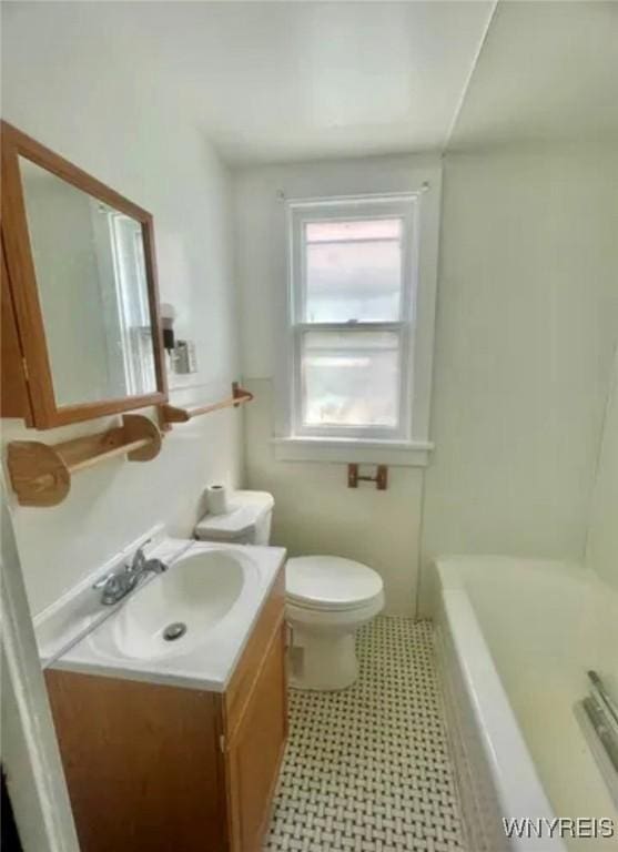 11 Verdun Ave, Buffalo, NY 14214 - full bath featuring vanity, toilet, and a tub to relax in