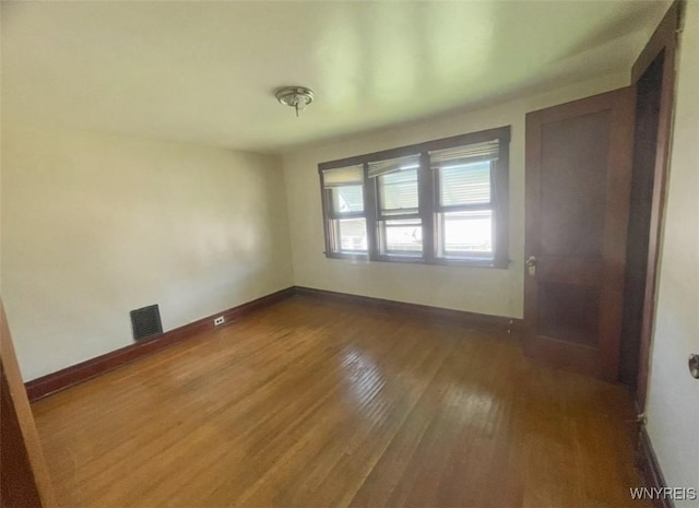 11 Verdun Ave, Buffalo, NY 14214 - spare room featuring baseboards and dark wood-style floors