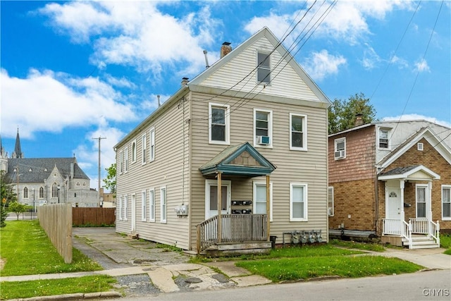 711 Bristol St, Utica, NY 13502 - view of front of house with a chimney
