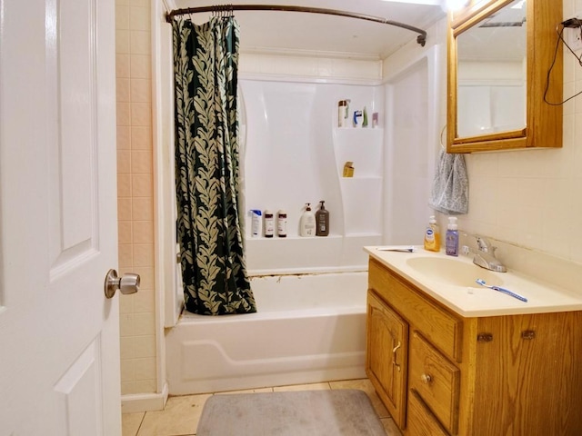 1459 Culver Rd, Rochester, NY 14609 - bathroom featuring shower / tub combo with curtain, vanity, and tile patterned floors