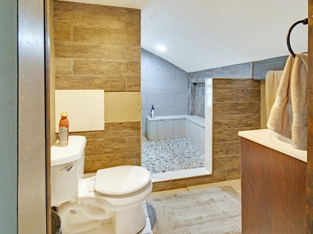 1459 Culver Rd, Rochester, NY 14609 - full bath featuring lofted ceiling, tile walls, a shower, and vanity