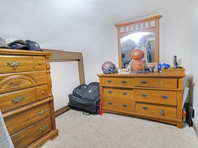1459 Culver Rd, Rochester, NY 14609 - carpeted bedroom featuring vaulted ceiling