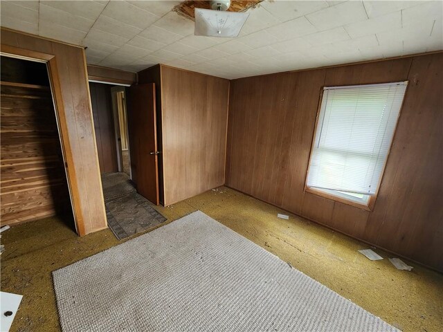 98 Gardeau St, Perry, NY 14530 - unfurnished bedroom with wood walls