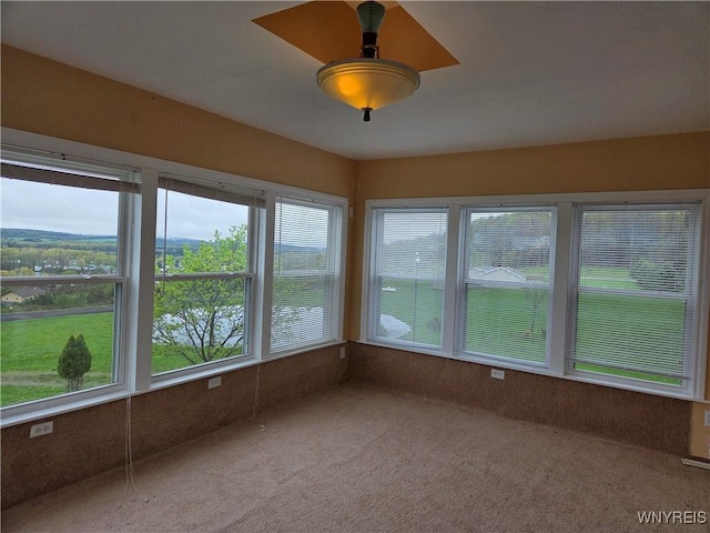 9600 Vermont View Rd, Machias, NY 14101 - unfurnished sunroom featuring carpet and plenty of natural light