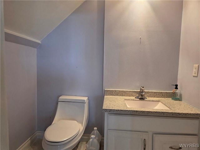9600 Vermont View Rd, Machias, NY 14101 - bathroom with vanity, vaulted ceiling, and toilet