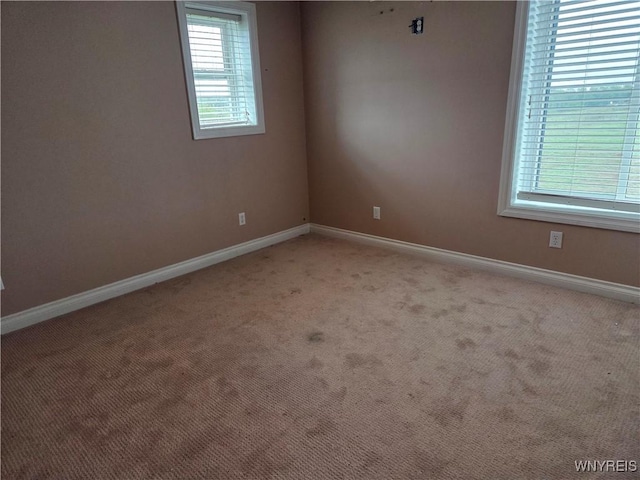 9600 Vermont View Rd, Machias, NY 14101 - empty room featuring baseboards and light colored carpet
