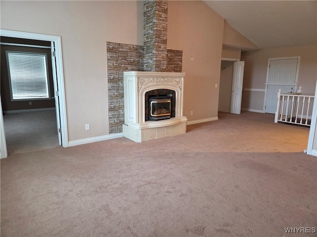 9600 Vermont View Rd, Machias, NY 14101 - unfurnished living room with carpet floors, baseboards, vaulted ceiling, and a tiled fireplace