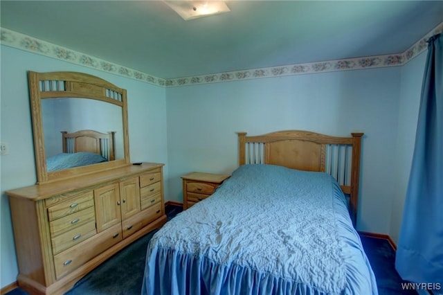 7 Forsythia Ct, Orchard Park, NY 14127 - bedroom with baseboards and dark colored carpet