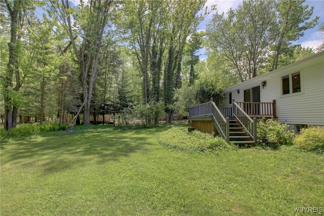 7 Forsythia Ct, Orchard Park, NY 14127 - view of grassy yard featuring a deck and stairway